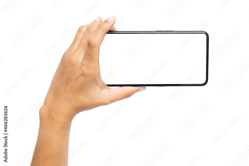 Woman hand holding the black smartphone with blank screen and modern frameless design isolated on white background Woman hand holding the black smartphone with blank screen and modern frameless design isolated on white background