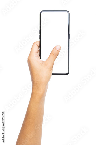 Woman hand holding the black smartphone with blank screen and modern frameless design isolated on white background