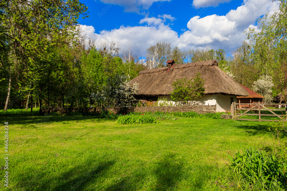 Ancient traditional ukrainian rural house  in Open air Museum of Folk Architecture and Folkways of Middle Naddnipryanschina in Pereyaslav, Ukraine