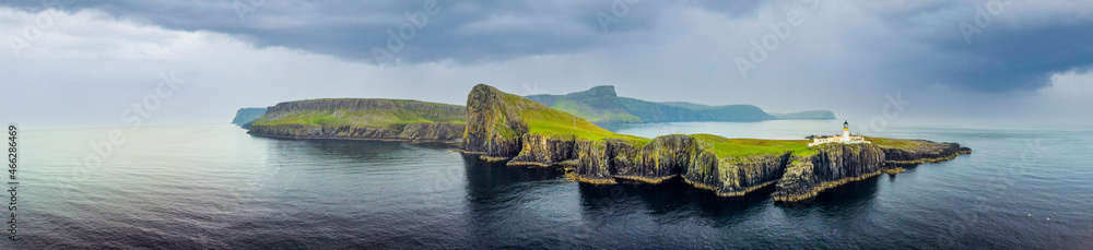 Overcast skies and gathering storm over Point of Neist Light House, Isle of Skye, Scotland