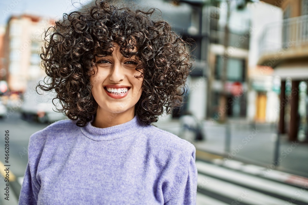 Young middle east woman smiling confident at street Young middle east woman smiling confident at street