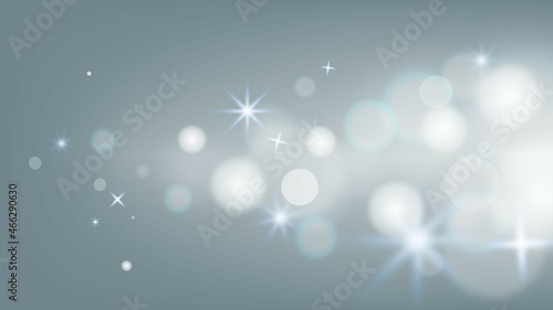 Silver bokeh background with dreamlike winter daybreak