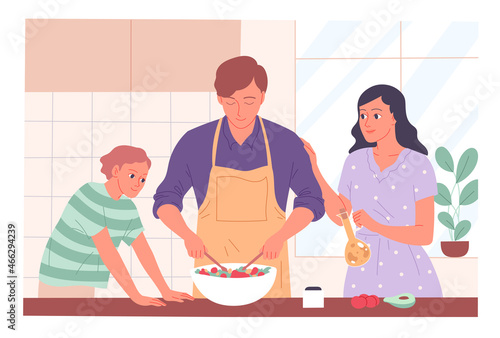 Family in the kitchen. Man makes salad, wife gives him dressing