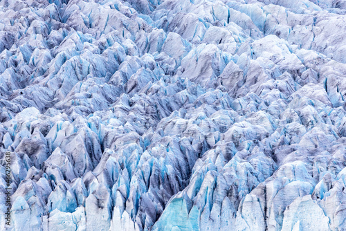 Close up detail of the compressed glacial blue ice of the Fjallsjokull glacier, Southern Iceland. Part of the Vatnajokull National Park photo