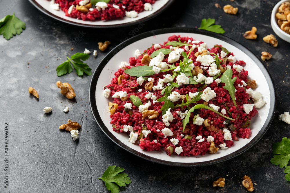 Bulgur salad with beetroot, walnuts, arugula and feta cheese. Healthy diet food Bulgur salad with beetroot, walnuts, arugula and feta cheese. Healthy diet food