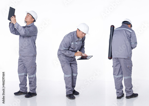 Full length portrait 50s 60s Asian elderly Man in Gray uniform hardhat as electric engineer, isolated