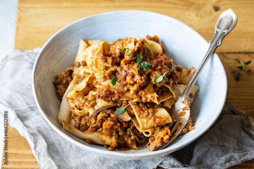 Home made pasta with vegan lentil ragu photo