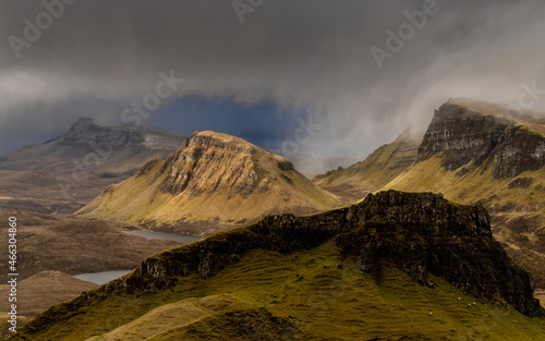 Ilse of Skye, Scottish Highlands, Landmark photography location, moody and stormy view of the famous landmark the Quiraing, mountains and hills on the Isle of Skye northern Scotland. 