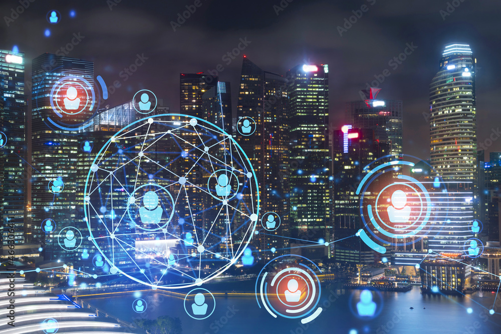 Glowing Social media icons on night panoramic city view of Singapore, Asia. The concept of networking and establishing new connections between people in businesses. Double exposure. Glowing Social media icons on night panoramic city view of Singapore, Asia. The concept of networking and establishing new connections between people in businesses. Double exposure.