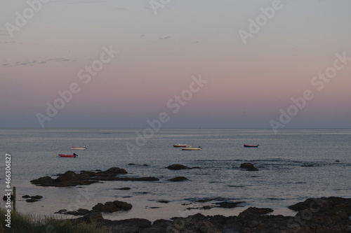 Boats on the sea at sunset