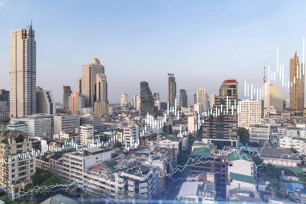 Financial stock chart hologram over panorama city view of Bangkok, business center in Southeast Asia. The concept of international transactions. Double exposure.
