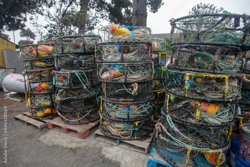 Crab and Lobster Traps Stacked on a Wharf Ready to be Deployed to Catch Seafood