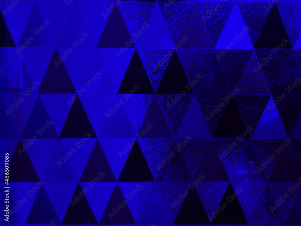 Fototapeta premium Abstract blurred blue geometric background.