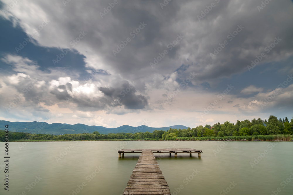 Pier on the pond Jenoi-to, Hungary Pier on the pond Jenoi-to, Hungary
