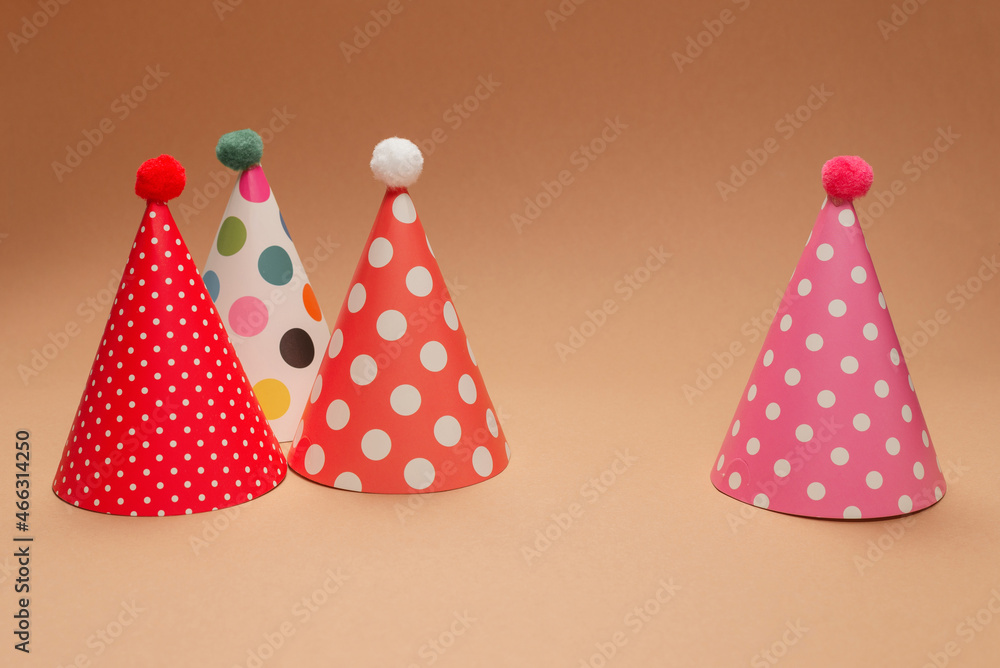 Colorful birthday cap on brown background. Colorful birthday cap on brown background.