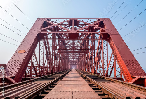 Fototapeta Naklejka Na Ścianę i Meble -  Harding Bridge. An old steel railroad bridge over the wide and fast river Padma.
