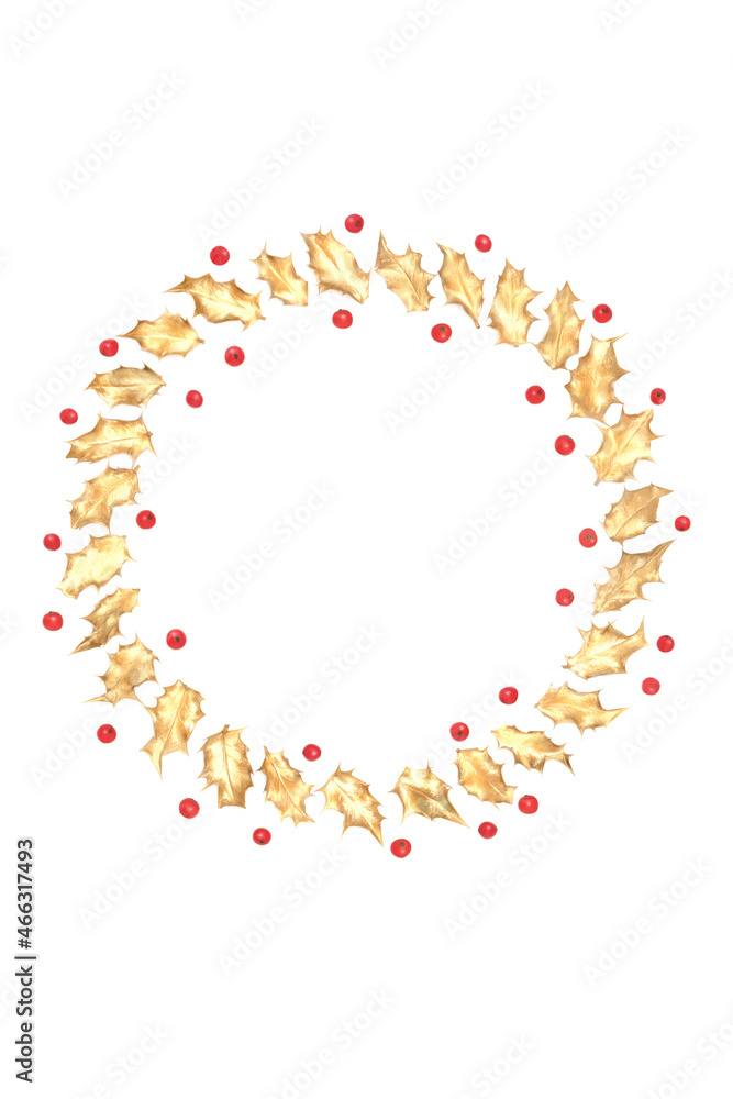 Minimal Christmas wreath of gold holly leaves and red berries. Design element for winter, Xmas and New Year season on white background. Top view, copy space. Minimal Christmas wreath of gold holly leaves and red berries. Design element for winter, Xmas and New Year season on white background. Top view, copy space.