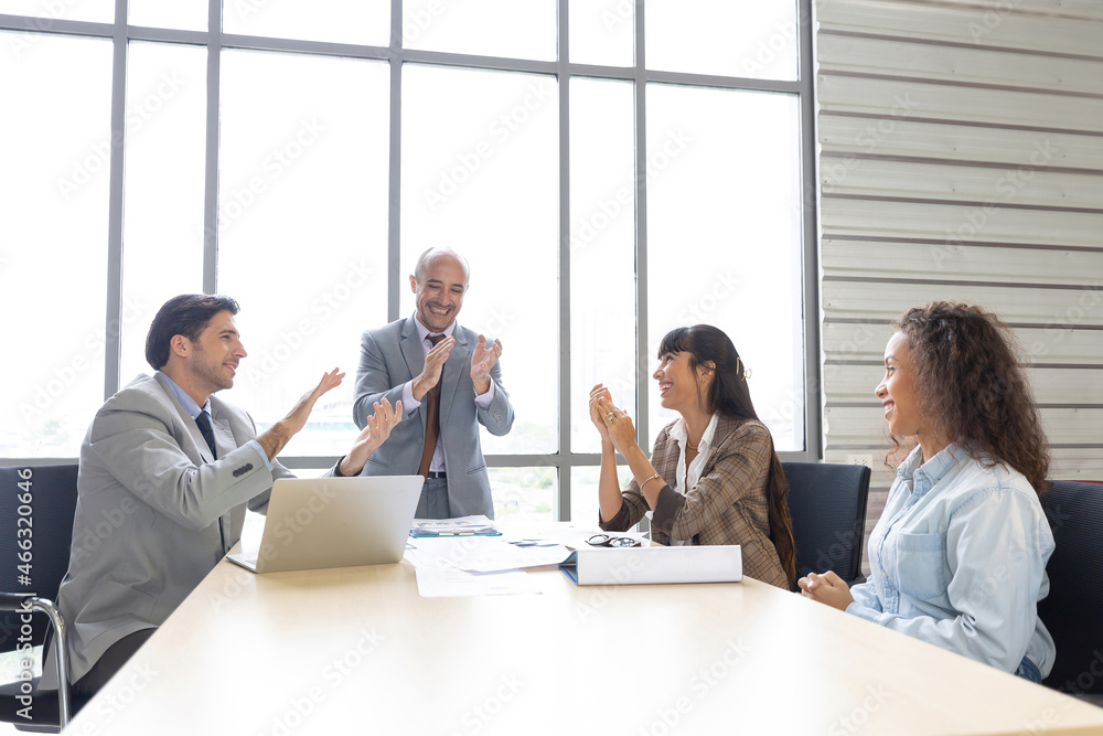 business people clapping hands together for success work in conference room business people clapping hands together for success work in conference room