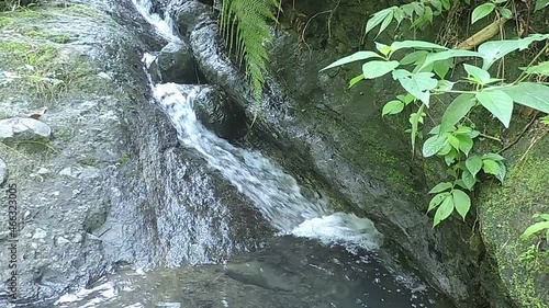 river water that flows down from the top of the hill