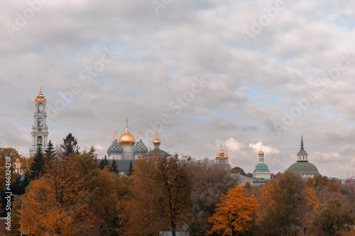 Obraz na plátně Trees and the Trinity Lavra of st