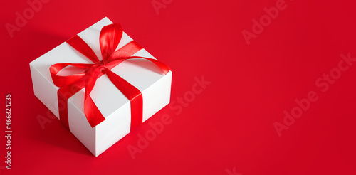 banner gift white box with red bow christmas background