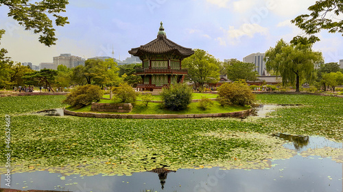 Hyangwon Jeong Pavillion park in Gyeongbok Palace, Seoul City, South Korea. Beautiful Korean wooden traditional building with a little lake and nature all around the garden. photo