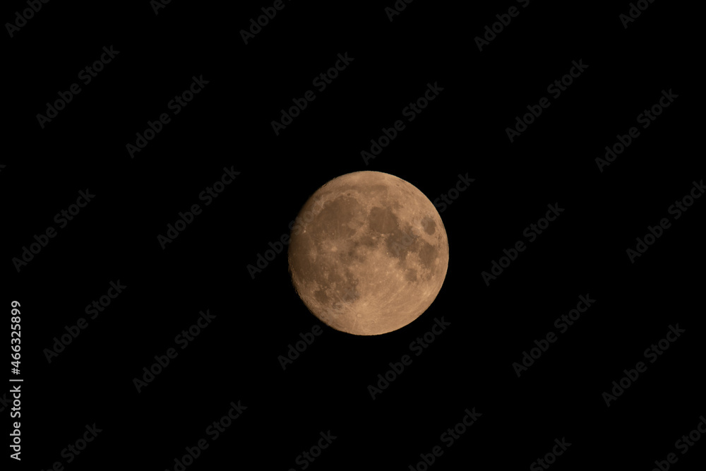 Liechtenstein, July 22, 2021 Full moon in the dark sky Liechtenstein, July 22, 2021 Full moon in the dark sky