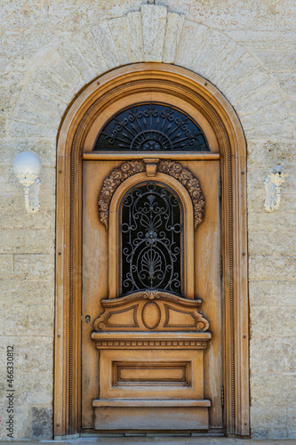An old door in a stone wall