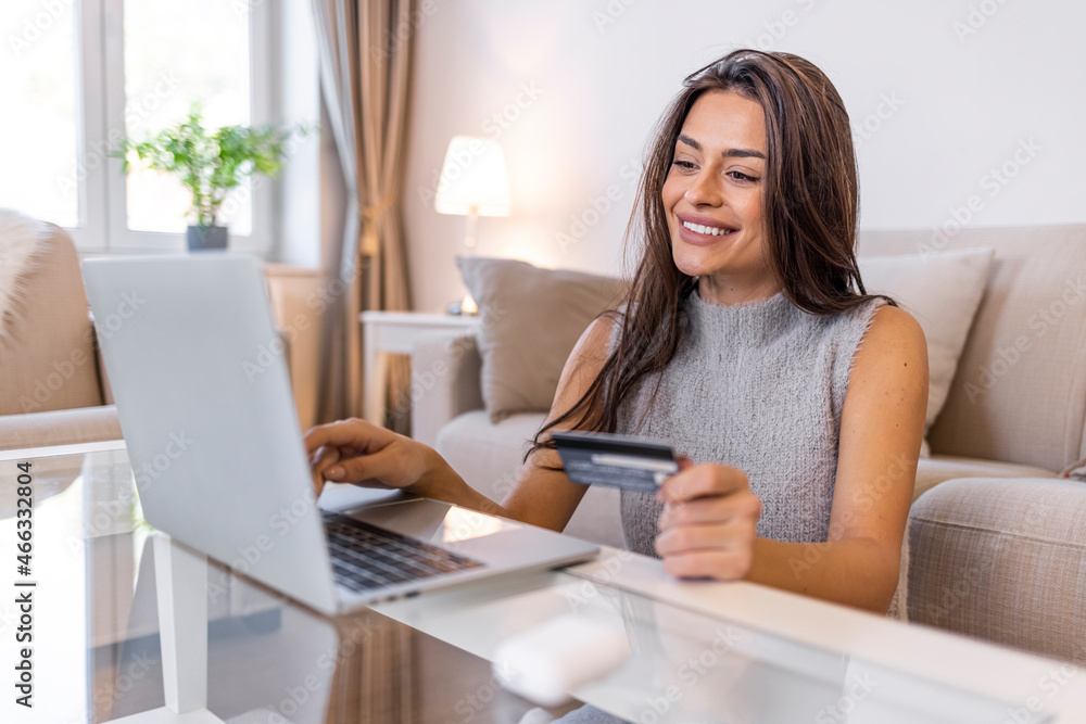 Review and compare dozens of stores and products at once. Shot of an attractive young woman making payments online with a credit card. Her bills are always paid on time Review and compare dozens of stores and products at once. Shot of an attractive young woman making payments online with a credit card. Her bills are always paid on time