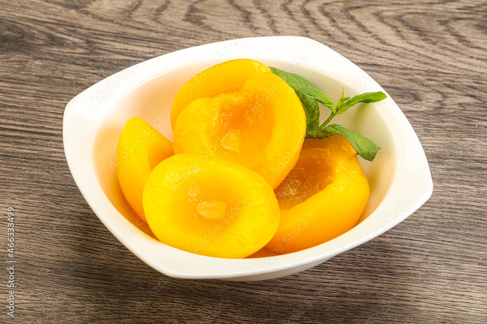 Sweet ripe canned peaches with mint Sweet ripe canned peaches with mint