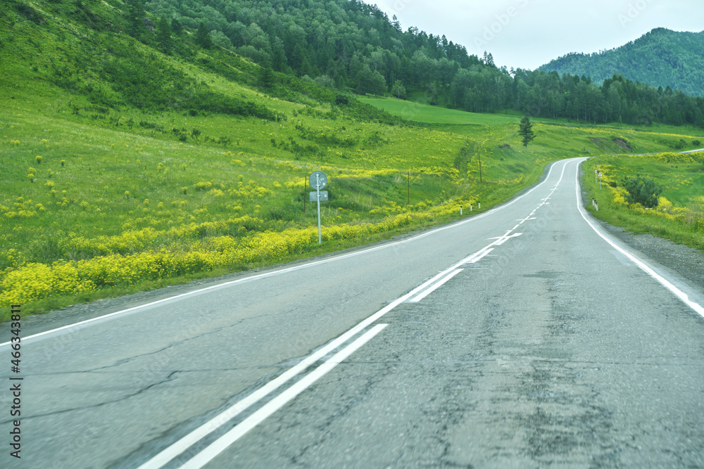 Vacation roadtrip landscape. Russian Altai mountains. Multa region. Holiday at home. Staycation concept. Long distanse road. Reduce carbon footprint. Sustainable lifestyle. Holiday trail. Local travel