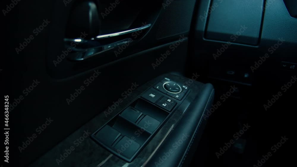 Close-up of the car door with electric adjustment of the window Close-up of the car door with electric adjustment of the window