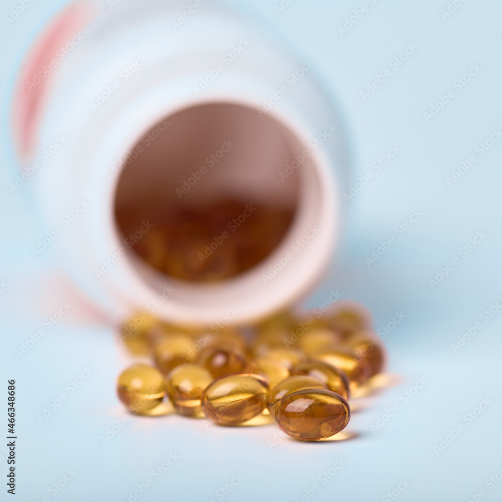 Omega 3 capsules on a light background
