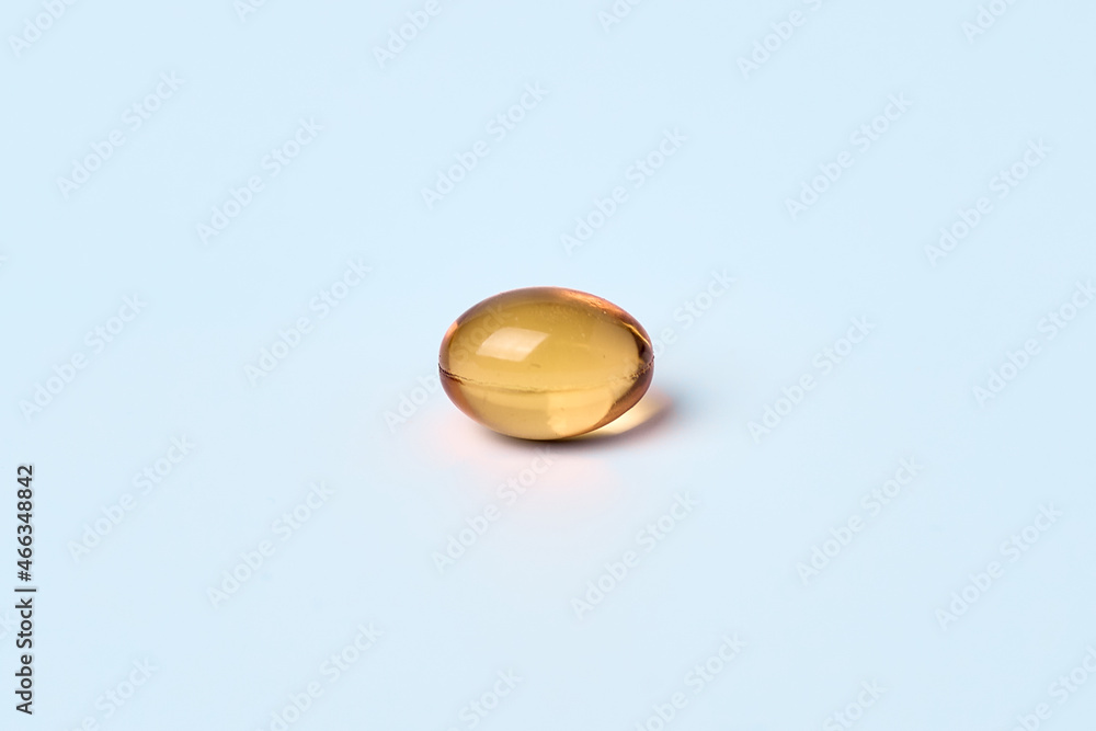 Omega 3 capsules on a light background Omega 3 capsules on a light background