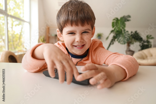 Little boy watching cartoon...