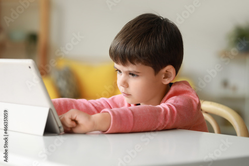 Little boy watching cartoon...