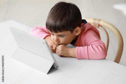 Little boy watching cartoon...