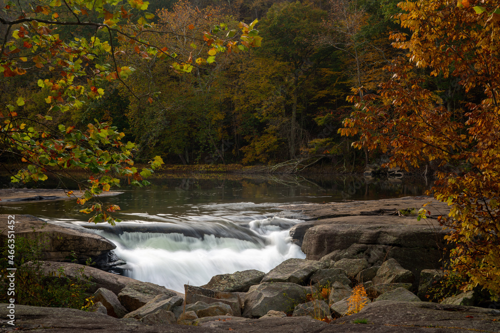 Valley Falls State Park near Fairmont in West Virginia on a colorful misty autumn day with fall colors on the trees