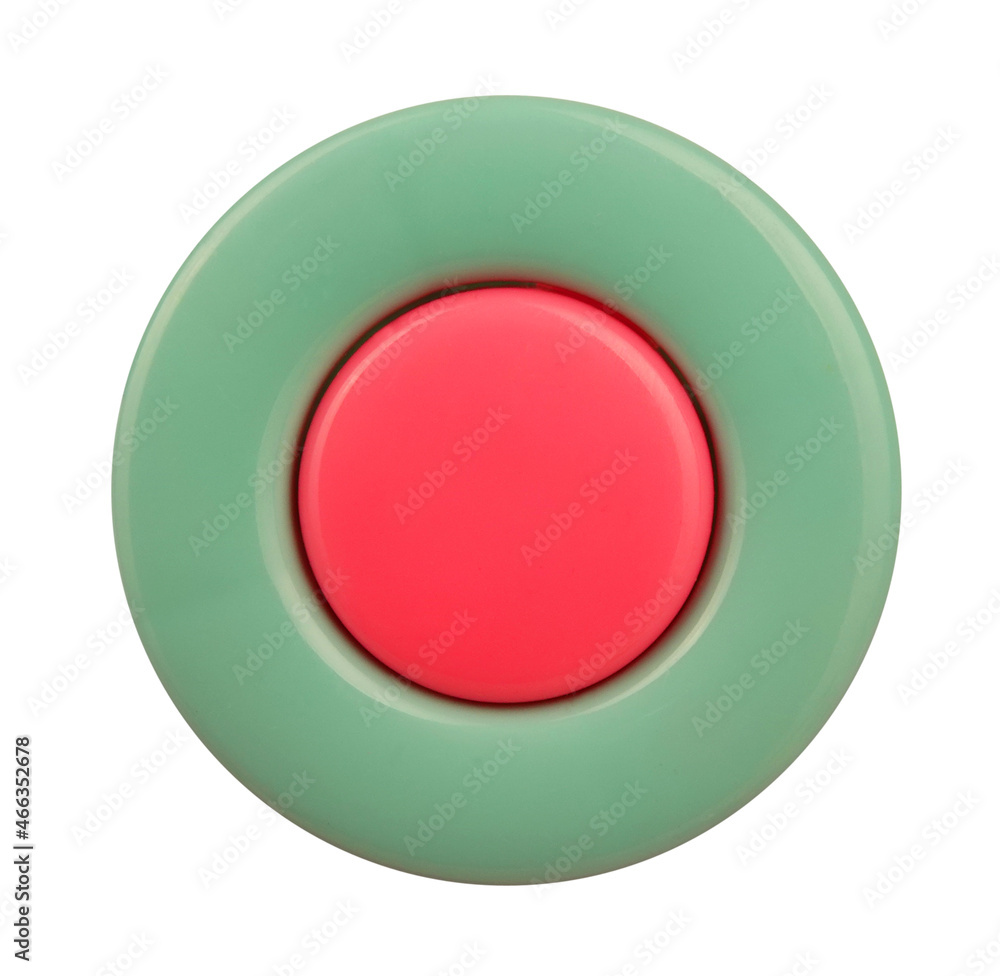 Red green plastic wheel isolated on white background. Part of vehicle for children or toy Red green plastic wheel isolated on white background. Part of vehicle for children or toy