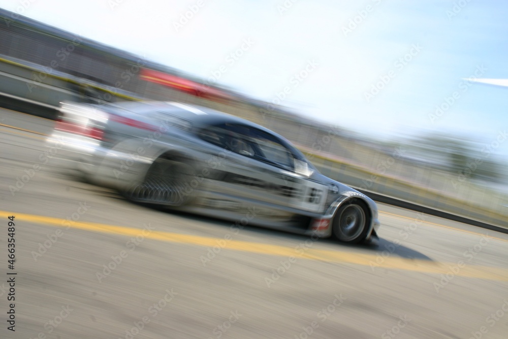 Fast car riding close
