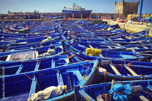 blue boats in the harbor
