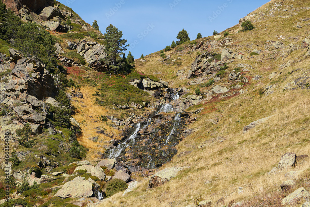 Obraz na płótnie A small cascade waterfall, pyrenees in andorra w salonie