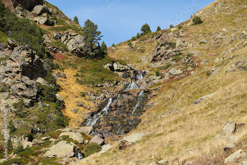 A small cascade waterfall, pyrenees in andorra