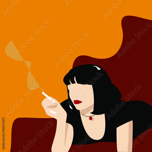 Photo A woman with a cigarette in hand