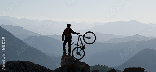 cyclist enjoying the summit