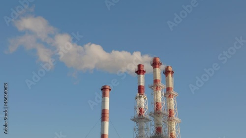 Pipes of a power plant (CHP) emitting white smoke