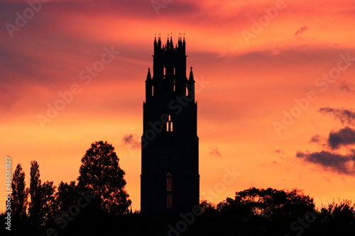 Sunset over Boston Stump tower. Silhouette with magnificent colourful clouds over the Lincolnshire historic church landmark.	
 photo