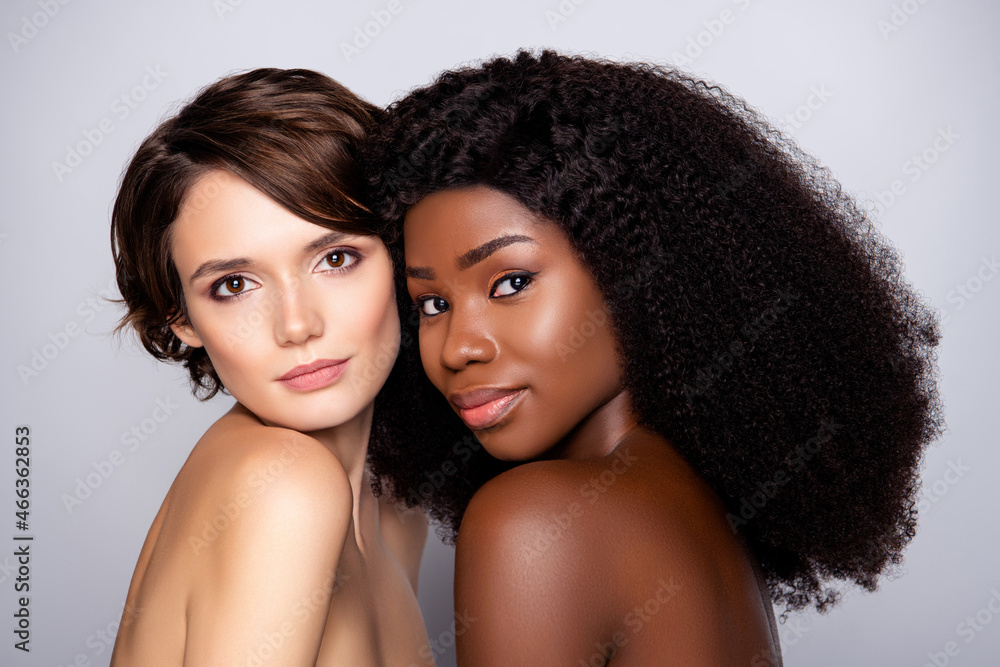 Portrait of two attractive nude naked tender women life partners bonding flirty mood isolated over grey pastel color background Portrait of two attractive nude naked tender women life partners bonding flirty mood isolated over grey pastel color background