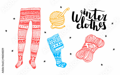 Vector winter illustration with set warm clothing. Knitted, patterned tights, skeins of yarn made of natural wool, lettering winter clothes are depicted. Background with snowflakes. Labels, etc.