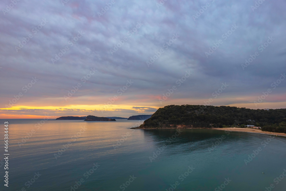 One hundred percent cloud covered sunrise over the sea